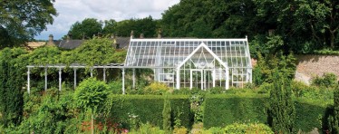 A White Hartley Botanic Greenhouse From The Achitectural Glasshouse Range