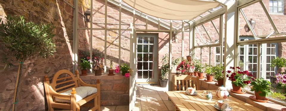 Interior of a White Hartley Botanic Lean-to Greenhouse