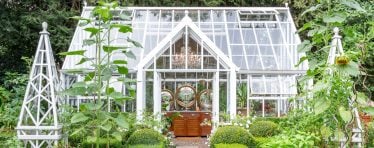 White Hartley Botanic Glasshouse in a Garden